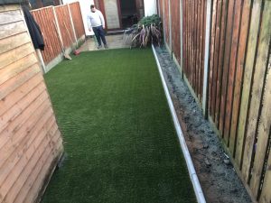 Back Garden with Artificial Grass and Bullnose Kerbs in Greystones, Co. Wicklow