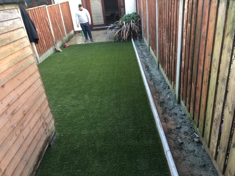 Back Garden with Artificial Grass and Bullnose Kerbs in Greystones, Co. Wicklow